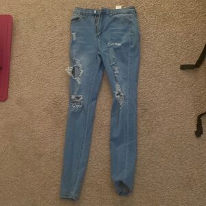 light wash ripped skinny jeans
